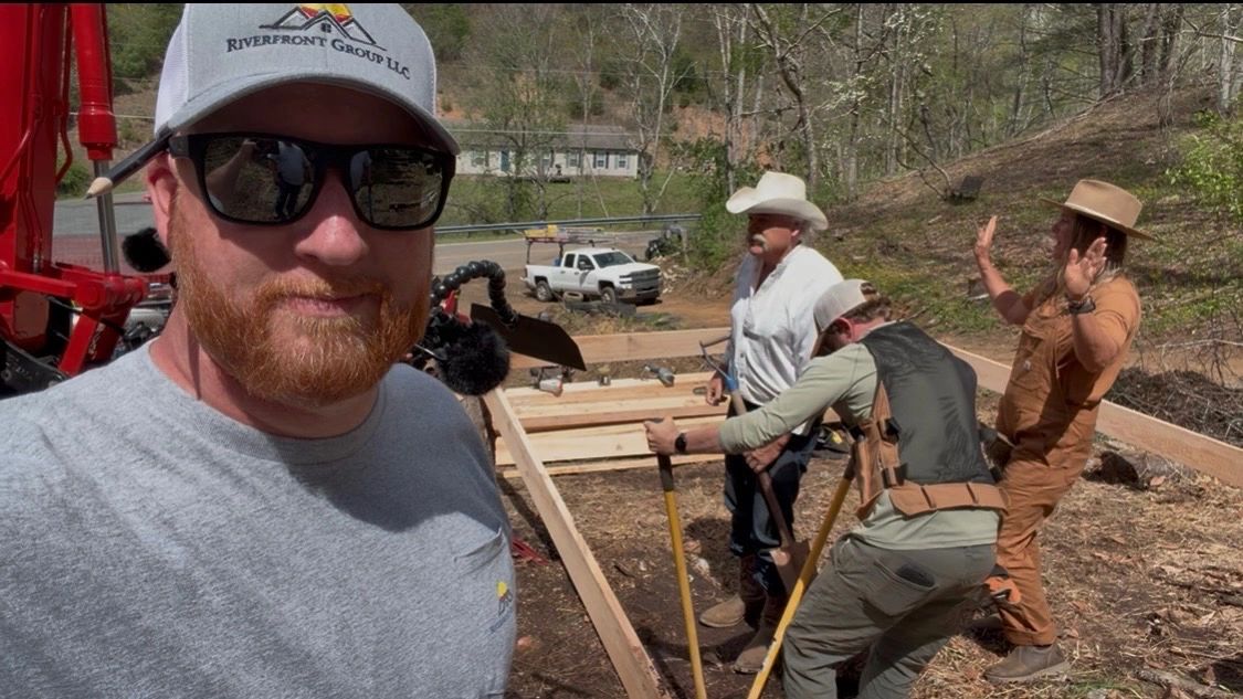 Adam Grabousky and crew filming with the Homestead Rescue production team